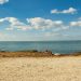 Tranquil view of the coastline in Trapani, Sicily with clear blue sky and sea.